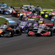 A photo of the cars lining up for the start of an IndyCar race.